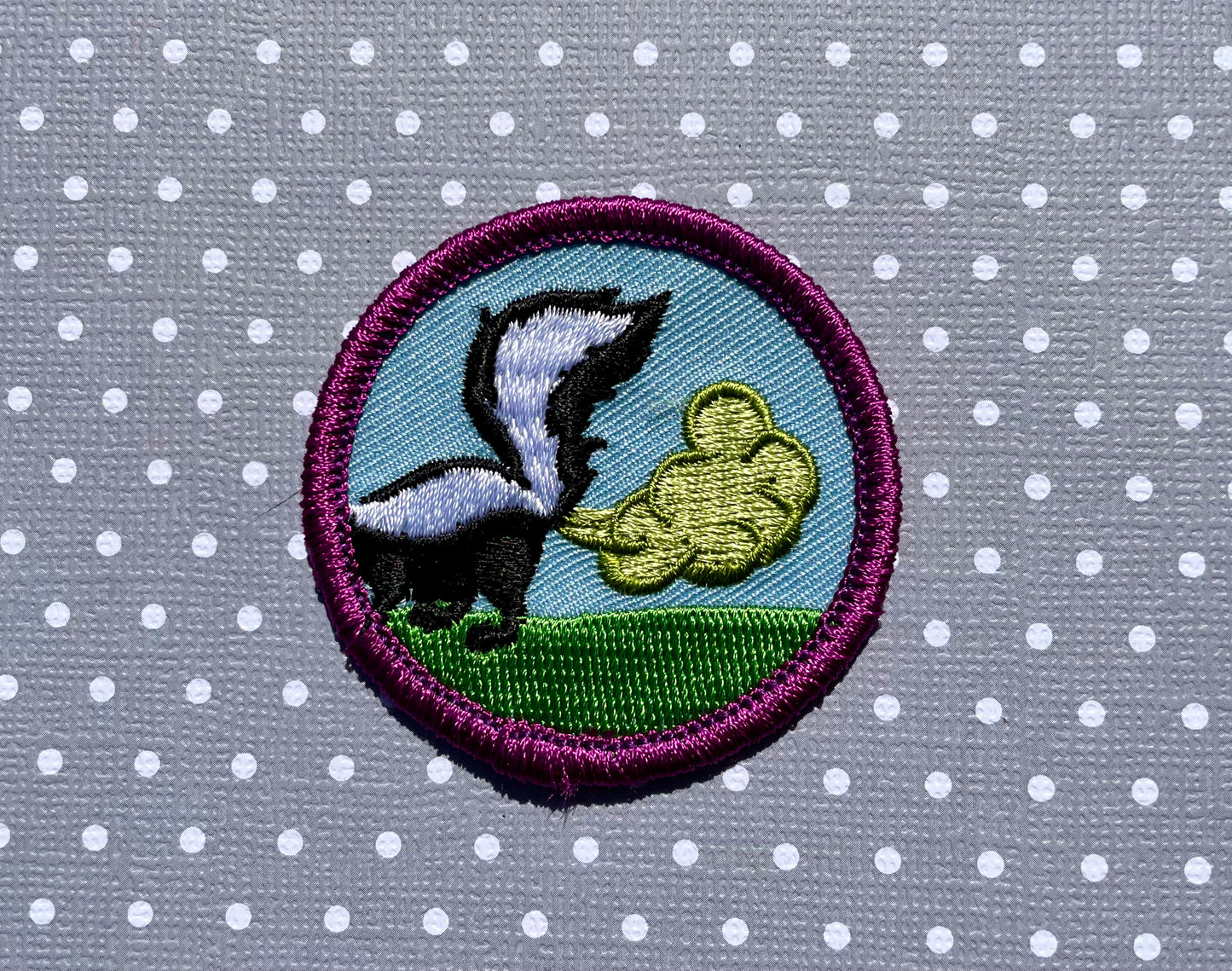 Sprayed by a Skunk, Pet Achievement Badge